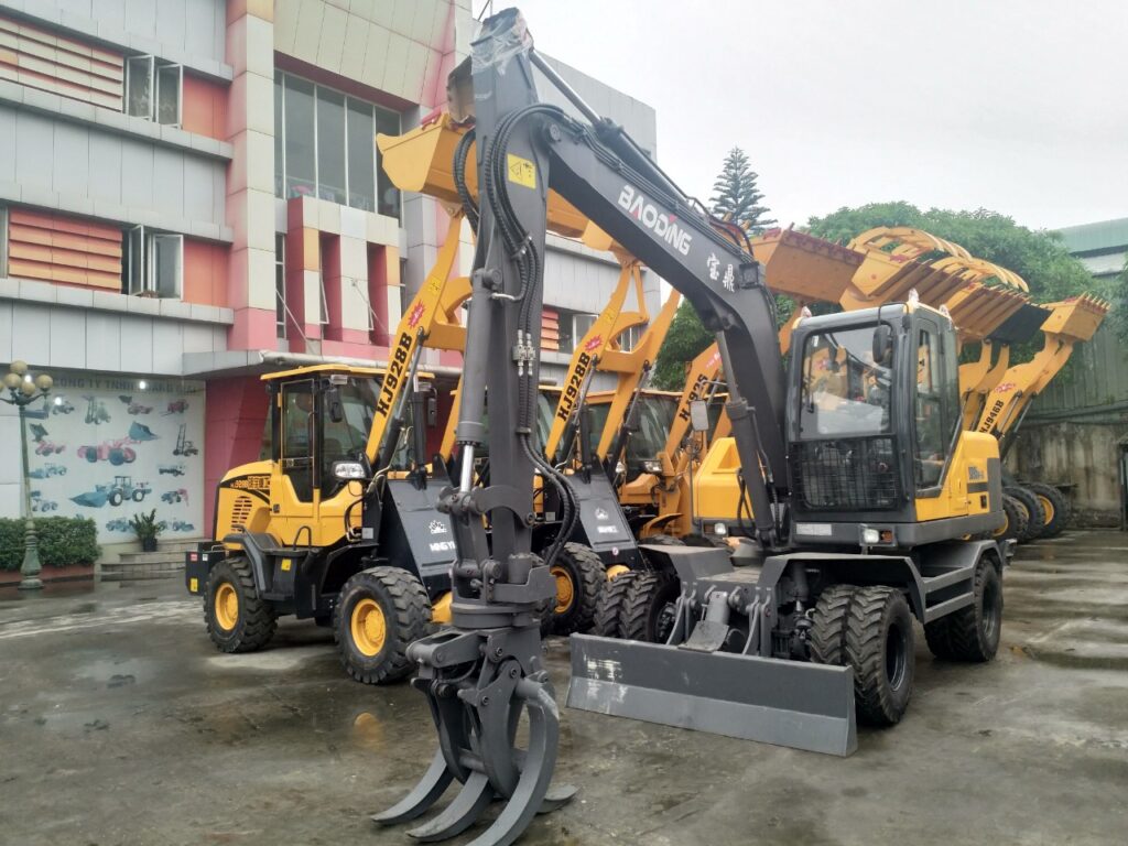 Máy xúc đào kẹp gỗ chính hãng tại Hoằng Giai