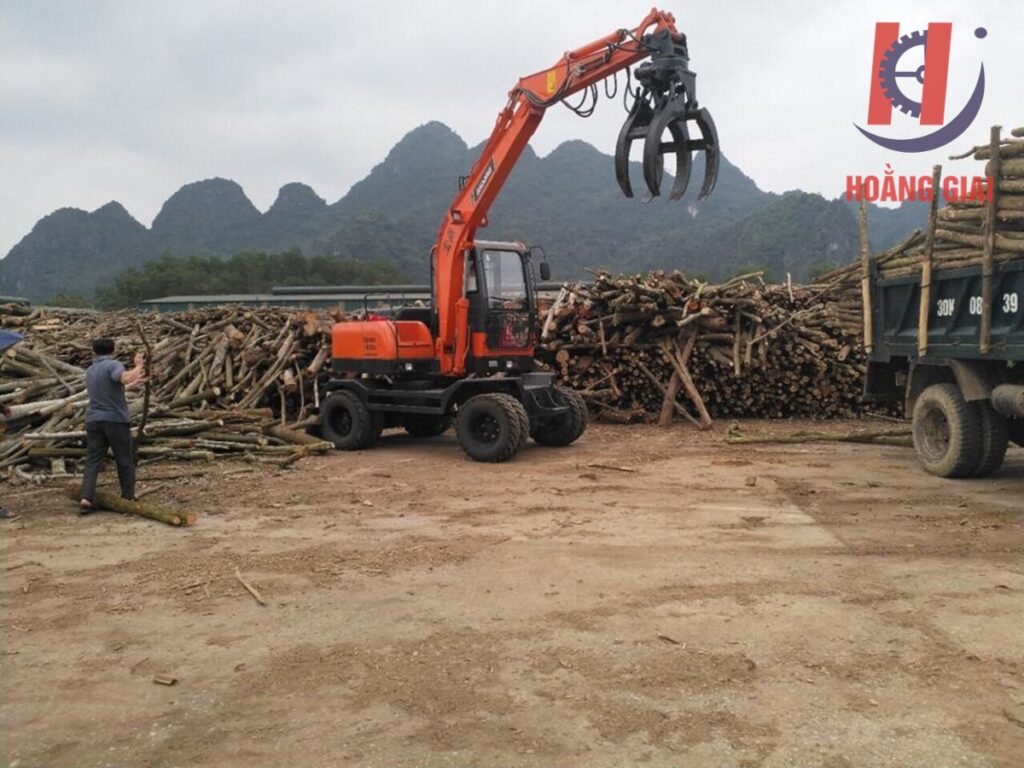 Máy xúc đào kẹp gỗ - Máy xúc đào kẹp gỗ Hoằng Giai